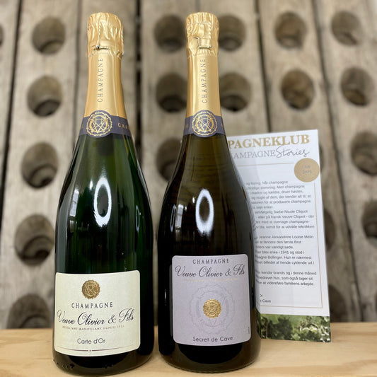 2 flasker champagne fra Veuve Olivier et Fils. Pupitre og klubflyer i baggrund. Champagne Carte d'Or og champagne Secret de Cave.