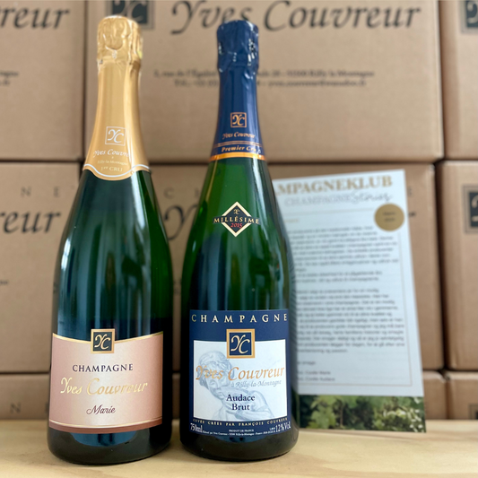 2 flasker champagne Yves Couvreur, Blanc de Blancs, klubkasse indhold marts 2025, folder med beskrivelse, baggrund champagne papkasser, Champagne Cuvée Marie og Cuvée Audace